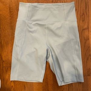 Girlfriend Collective High Rise Bike Shorts. Size Medium. Light Blue.